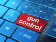 Illustration: Protection concept: Gun Control on computer keyboard background Protection concept: Gun Control on computer keyboard background