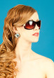 Beauty, fashion, glamor. Portrait of a beautiful redheaded styli