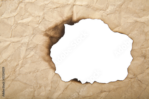 Photo: white hole is in an old paper white hole is in an old paper
