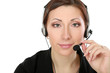 Close-up of young customer service girl with a headset