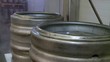 Flushing beer kegs at a brewery.