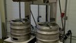 Flushing beer kegs at a brewery.