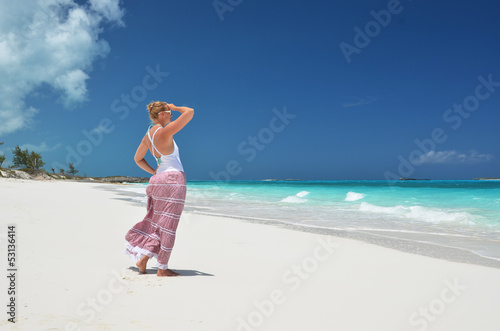 Photo: Girl on the desrt beach. Exuma, Bahamas Girl on the desrt beach. Exuma, Bahamas