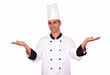 Male cook standing with palms open