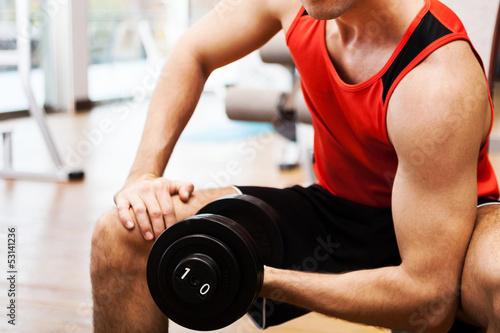 Photo: Bodybuilder working out Bodybuilder working out