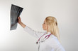 Blonde Doctor Looking At Xray