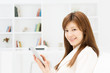 Photo: Beautiful young businesswoman working in office Beautiful young businesswoman working in office