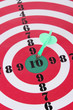 Target with dart close-up