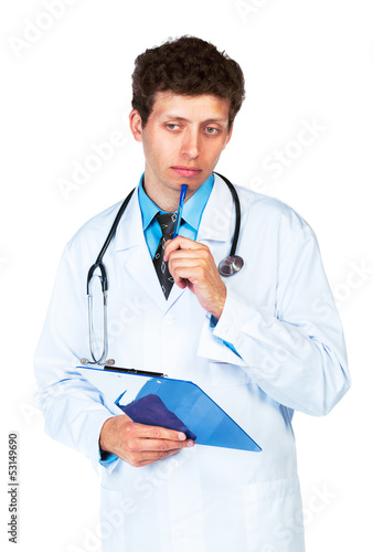 Photo: Portrait of deliberating young male doctor writing on a patient' Portrait of deliberating young male doctor writing on a patient'