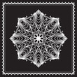 Vector: White lace, round snowflake pattern isolated on black White lace, round snowflake pattern isolated on black
