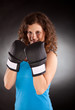 beautiful sporty woman with box gloves
