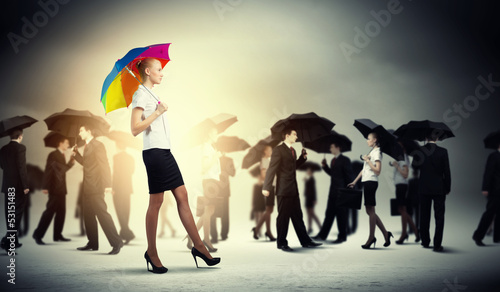 Photo: Businesswoman with umbrella Businesswoman with umbrella