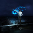 Photo: Businessman draws a glowing signs Businessman draws a glowing signs