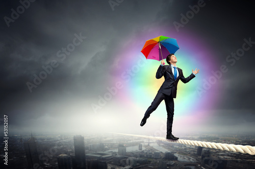 Photo: Businessman with umbrella Businessman with umbrella