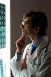 Man doctor looking at x-ray