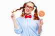 Photo: Young woman holding candy Young woman holding candy