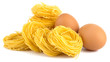 Italian egg pasta nest isolated on white background