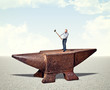 man on iron anvil