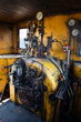 Yellow engine room on the steam locomotive