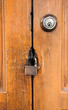 master key on wood door and  key knob