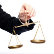 hand holding a balance