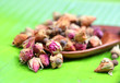 Flower tea rose buds on banana leaves