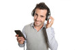 Photo: Cheerful man listening to music with headphones Cheerful man listening to music with headphones
