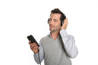 Man relaxing with headset and music player