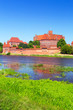 Malbork castle in summer scenery, Poland