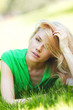 Foto: Woman lying on grass Woman lying on grass