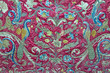 detail of old baroque vestment - peacocks motive