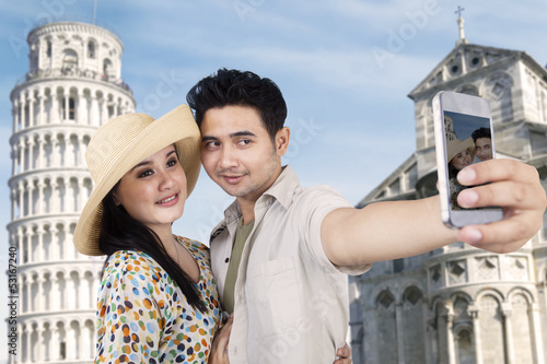 Photo: Asian couple travel and take picture at Rome Asian couple travel and take picture at Rome