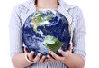 Close-up of earth in woman's hands