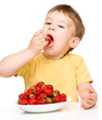 Photo: Happy little boy with strawberries Happy little boy with strawberries