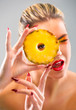Photo: Woman close up with a pineapple Woman close up with a pineapple