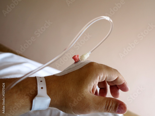 Photo: Patient's hand in the hospital with an IV Patient's hand in the hospital with an IV