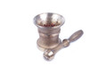 Old brass mortar with with a pestle isolated on a white