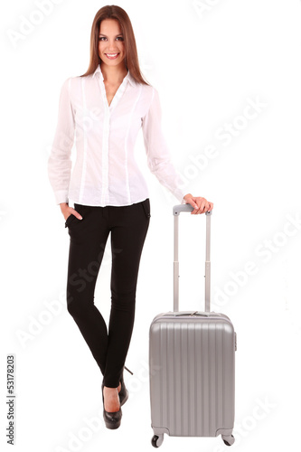 Photo: Young businesswoman with suitcase isolated on white Young businesswoman with suitcase isolated on white