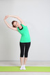 Portrait of beautiful young woman exercises