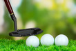 Photo: Golf ball and driver on green grass outdoor close up Golf ball and driver on green grass outdoor close up