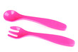Photo: Pink fork and spoon for baby food isolated on white Pink fork and spoon for baby food isolated on white