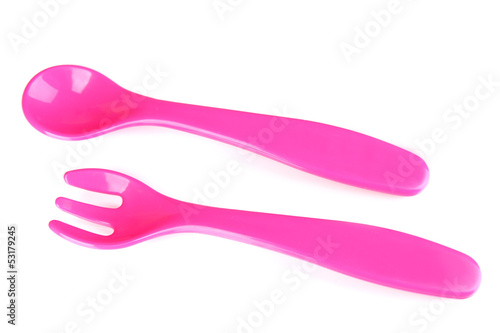 Photo: Pink fork and spoon for baby food isolated on white Pink fork and spoon for baby food isolated on white