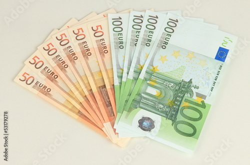Photo: Euro banknotes isolated on white Euro banknotes isolated on white