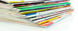 Many magazines isolated on white