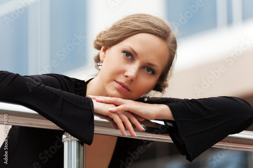 Photo: Sad beautiful woman daydreaming Sad beautiful woman daydreaming