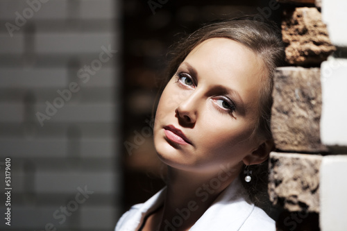 Photo: Sad beautiful woman on the night city street Sad beautiful woman on the night city street