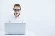 Beautiful business woman working on laptop