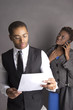 African American Business Couple with a contract