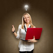 Photo: Idea Concept female with laptop shows well done Idea Concept female with laptop shows well done