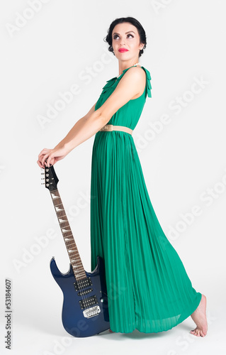 Photo: Pretty woman with guitar Pretty woman with guitar